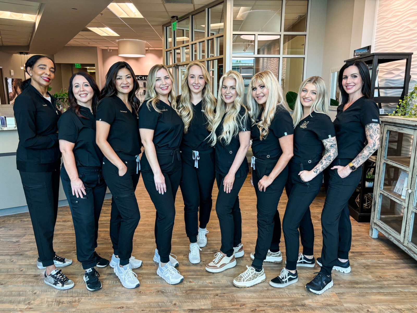 The Meridiem DermSpa dermatology specialist team in Tennesee wearing scrubs.