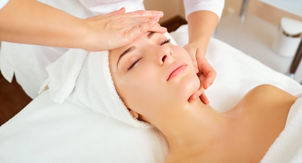 Beautiful woman at a facial massage